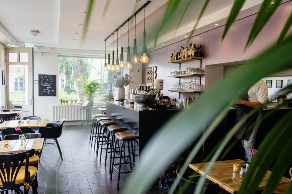 a room with tables and chairs